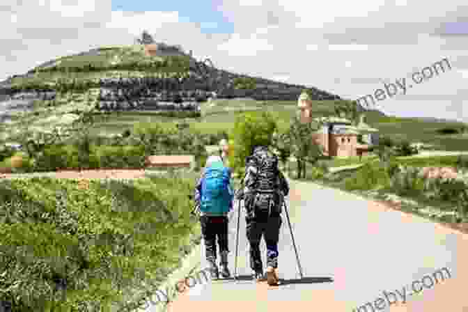 A Group Of Pilgrims Walking Along The Camino De Santiago On The Camino Jason