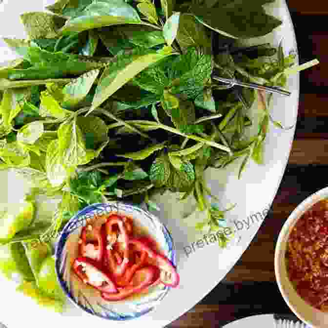 A Steaming Bowl Of Pho, Garnished With Fresh Herbs And Vegetables. A Pho Love Story Loan Le