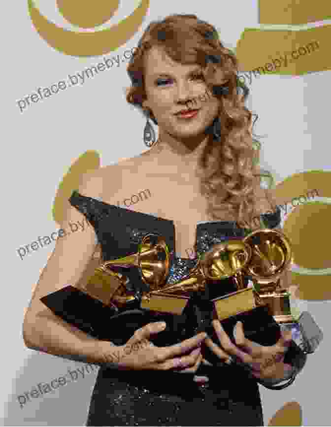 Taylor Swift Holding A Grammy Award Trophy Taylor Swift: 125 Facts You Need To Know